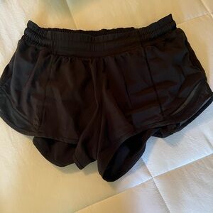 Lululemon black low-rise 2.5” Hotty Hot shorts